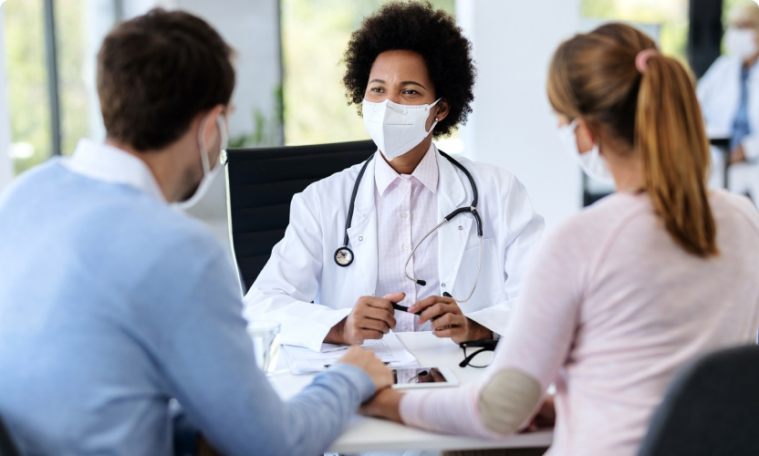 Woman doctor wearing lab coat with stethoscope isolated to our doctor