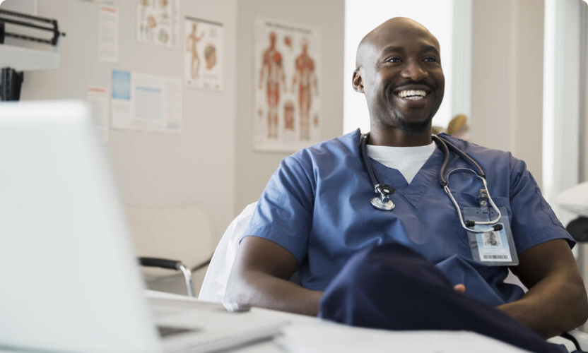 Woman doctor wearing lab coat with stethoscope isolated